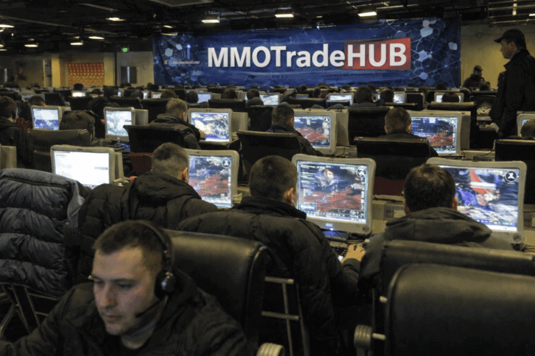 Screenshot of gamers at MMOTradingHUB conference focusing on online gaming and trading platforms.